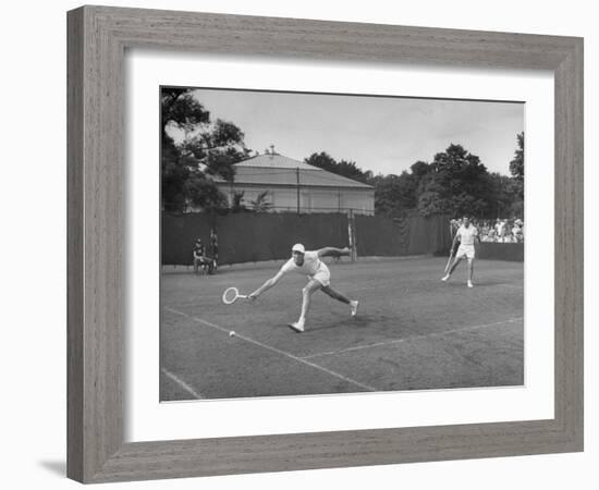 Tennis Players Yvon Petra and Pierre Pellizza in Action-null-Framed Photographic Print