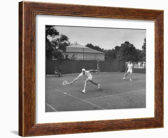 Tennis Players Yvon Petra and Pierre Pellizza in Action-null-Framed Photographic Print