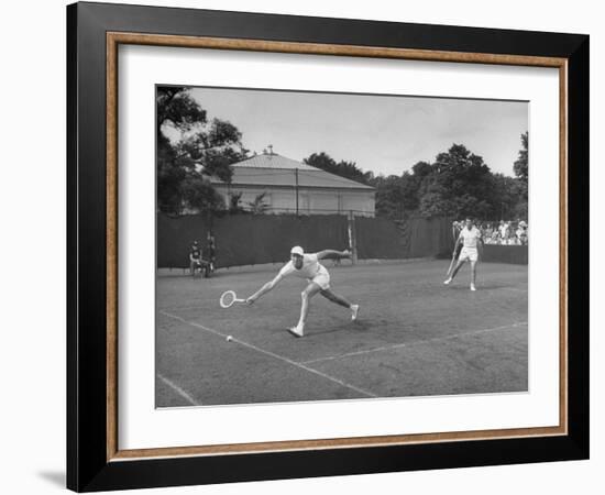 Tennis Players Yvon Petra and Pierre Pellizza in Action-null-Framed Photographic Print