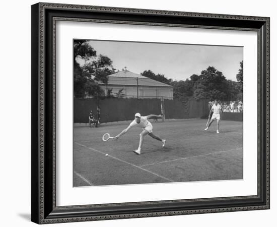 Tennis Players Yvon Petra and Pierre Pellizza in Action-null-Framed Photographic Print