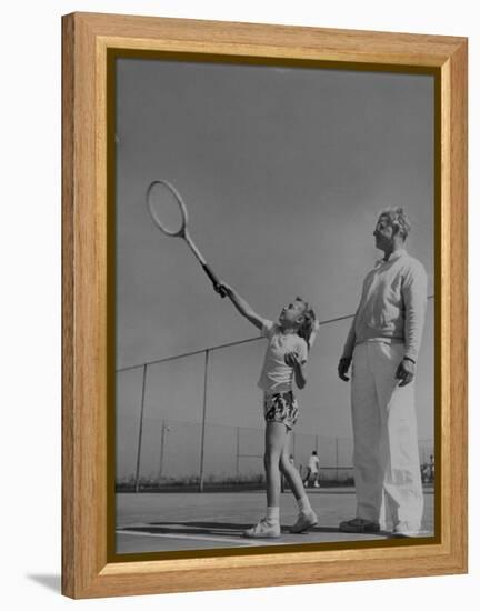 Tennis Teacher Wilbur Folsom Watching the Service of Young Anne Perkins-Allan Grant-Framed Premier Image Canvas