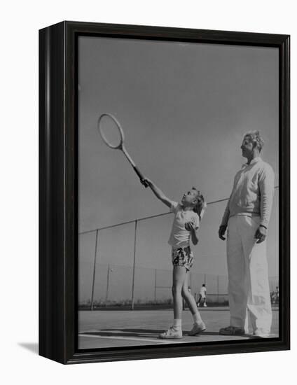 Tennis Teacher Wilbur Folsom Watching the Service of Young Anne Perkins-Allan Grant-Framed Premier Image Canvas