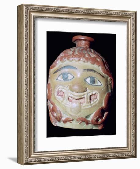 Terracotta Gorgon's head bottle. Artist: Unknown-Unknown-Framed Photographic Print