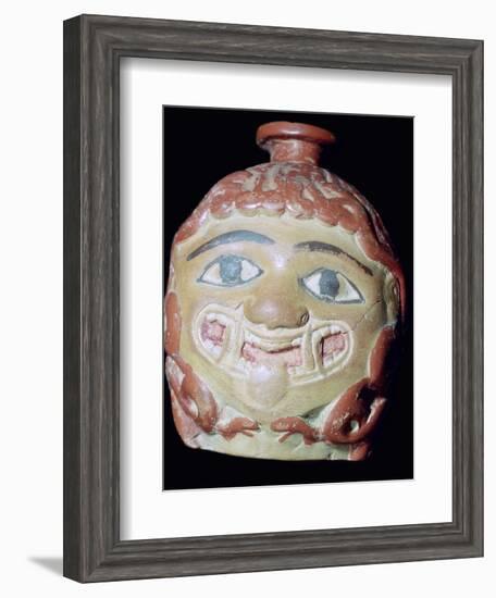 Terracotta Gorgon's head bottle. Artist: Unknown-Unknown-Framed Photographic Print