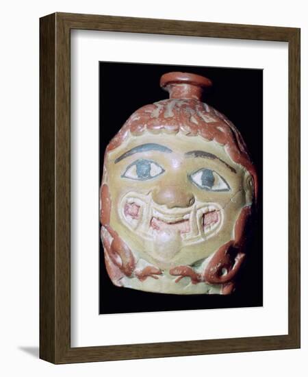 Terracotta Gorgon's head bottle. Artist: Unknown-Unknown-Framed Photographic Print