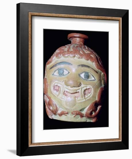 Terracotta Gorgon's head bottle. Artist: Unknown-Unknown-Framed Photographic Print