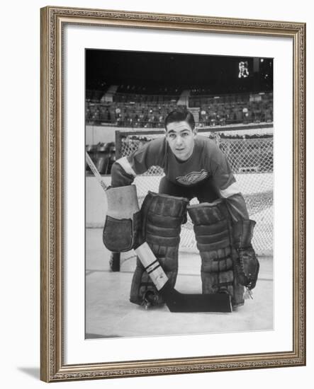 Terry Sawchuck, Star Goalie for the Detroit Red Wings, Posing in Front of Goal at Ice Arena-Alfred Eisenstaedt-Framed Premium Photographic Print