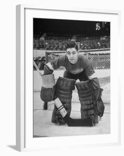 Terry Sawchuck, Star Goalie for the Detroit Red Wings, Posing in Front of Goal at Ice Arena-Alfred Eisenstaedt-Framed Premium Photographic Print