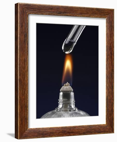 Test tube with liquid, over flame-null-Framed Photographic Print