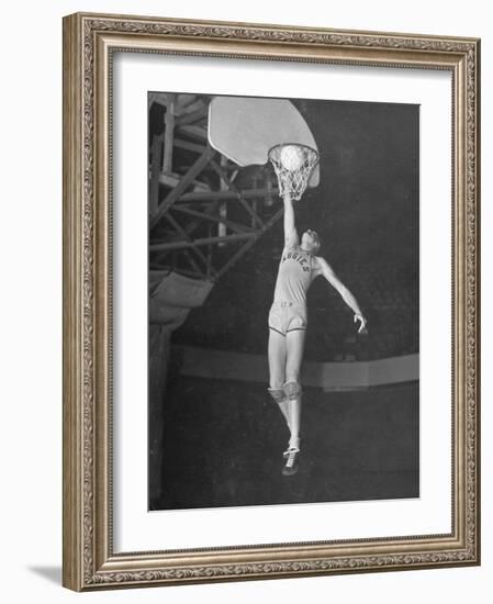 Texas A&M Basketball Player Bob Kurland Reaching to Make a Basket-Myron Davis-Framed Photographic Print