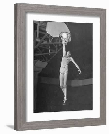 Texas A&M Basketball Player Bob Kurland Reaching to Make a Basket-Myron Davis-Framed Photographic Print