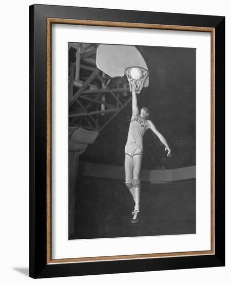 Texas A&M Basketball Player Bob Kurland Reaching to Make a Basket-Myron Davis-Framed Photographic Print