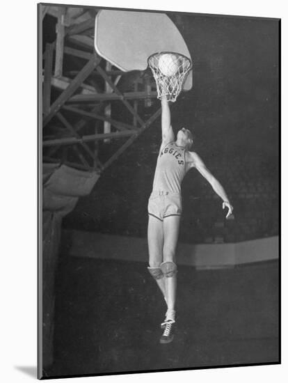 Texas A&M Basketball Player Bob Kurland Reaching to Make a Basket-Myron Davis-Mounted Photographic Print