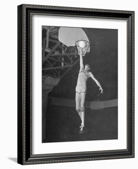 Texas A&M Basketball Player Bob Kurland Reaching to Make a Basket-Myron Davis-Framed Photographic Print