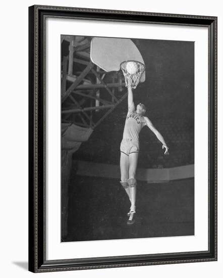 Texas A&M Basketball Player Bob Kurland Reaching to Make a Basket-Myron Davis-Framed Photographic Print