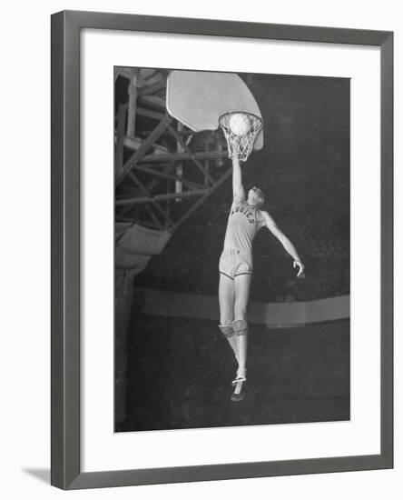 Texas A&M Basketball Player Bob Kurland Reaching to Make a Basket-Myron Davis-Framed Photographic Print