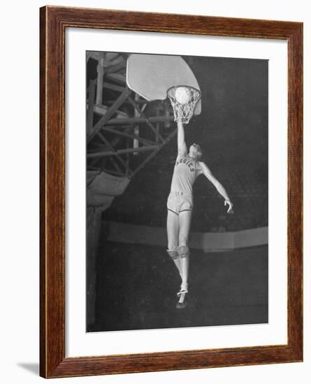 Texas A&M Basketball Player Bob Kurland Reaching to Make a Basket-Myron Davis-Framed Photographic Print