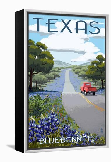 Texas - Bluebonnets and Highway-Lantern Press-Framed Stretched Canvas