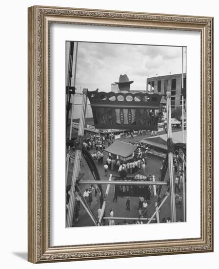 Texas Rancher with Kids, Perched 92-Ft. High on Ferris Wheel, Carnival Midway at County Fair-John Dominis-Framed Photographic Print