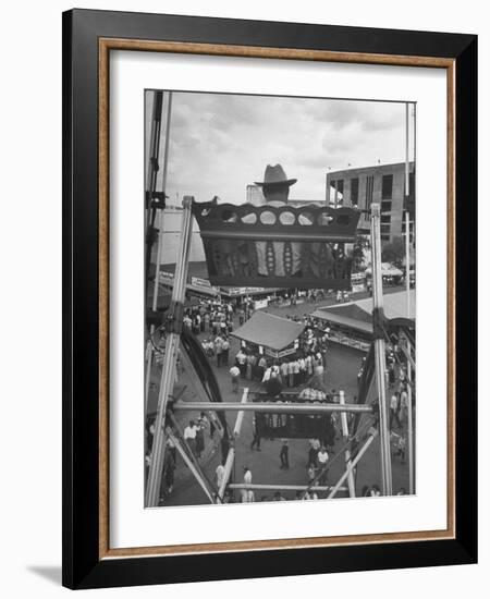 Texas Rancher with Kids, Perched 92-Ft. High on Ferris Wheel, Carnival Midway at County Fair-John Dominis-Framed Photographic Print