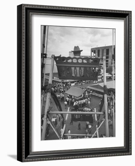 Texas Rancher with Kids, Perched 92-Ft. High on Ferris Wheel, Carnival Midway at County Fair-John Dominis-Framed Photographic Print