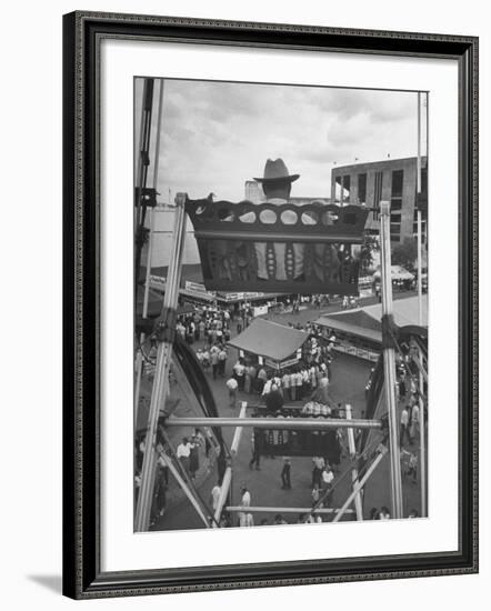 Texas Rancher with Kids, Perched 92-Ft. High on Ferris Wheel, Carnival Midway at County Fair-John Dominis-Framed Photographic Print