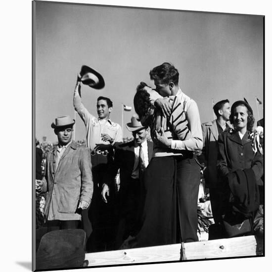 Texas University Students Kissing After a Close Football Victory over Southern Methodist University-Joe Scherschel-Mounted Photographic Print