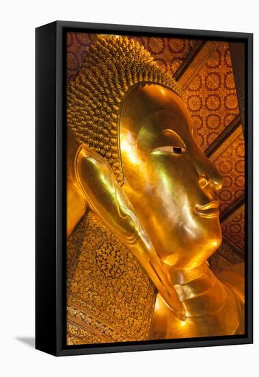 Thailand, Bangkok. Close-up of the head of the Reclining Buddha inside Wat Pho.-Brenda Tharp-Framed Premier Image Canvas
