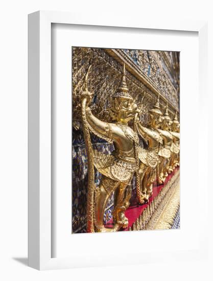 Thailand, Bangkok. Ko Ratanakosin, Wat Phra Kaew, Temple of the Golden Buddha detail.-Walter Bibikow-Framed Photographic Print