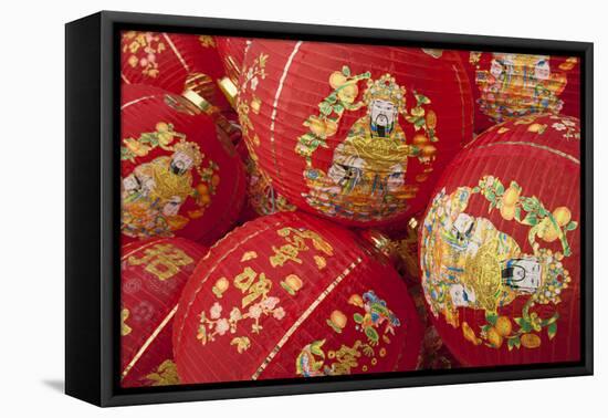 Thailand, Bangkok, Paper lanterns in a pile before being hung for festival.-Merrill Images-Framed Premier Image Canvas