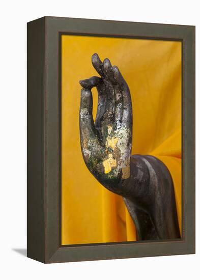 Thailand. Buddha Statue hand with gold leaf tokens.-Brenda Tharp-Framed Premier Image Canvas