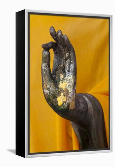 Thailand. Buddha Statue hand with gold leaf tokens.-Brenda Tharp-Framed Premier Image Canvas