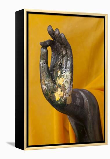 Thailand. Buddha Statue hand with gold leaf tokens.-Brenda Tharp-Framed Premier Image Canvas