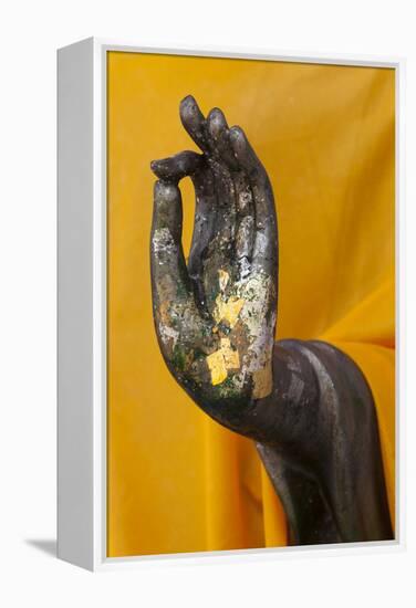 Thailand. Buddha Statue hand with gold leaf tokens.-Brenda Tharp-Framed Premier Image Canvas