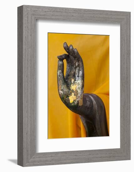 Thailand. Buddha Statue hand with gold leaf tokens.-Brenda Tharp-Framed Photographic Print