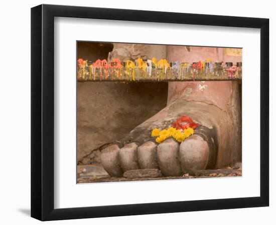 Thailand, Candle and marigold flowers at Buddha's feet-Gavriel Jecan-Framed Photographic Print