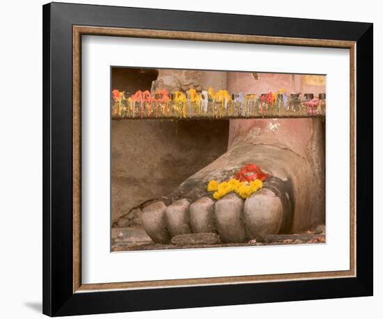 Thailand, Candle and marigold flowers at Buddha's feet-Gavriel Jecan-Framed Photographic Print