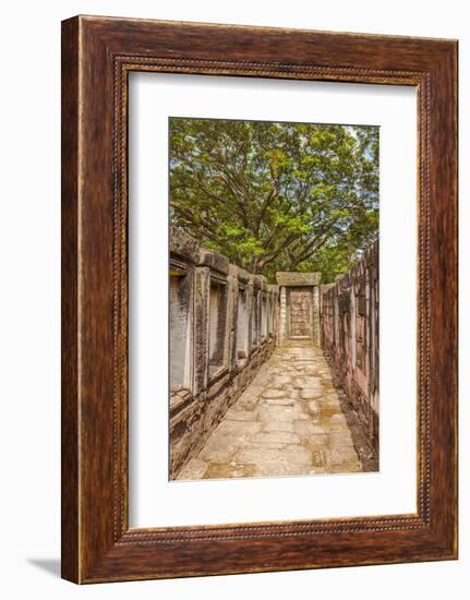 Thailand. Phimai Historical Park. Ruins of ancient Khmer temple complex.-Tom Haseltine-Framed Photographic Print