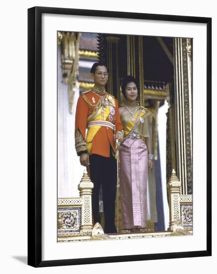 Thailand's King Bhumibol Adulyadej with Wife, Queen Sirikit at the Palace-John Dominis-Framed Premium Photographic Print