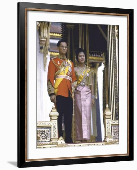 Thailand's King Bhumibol Adulyadej with Wife, Queen Sirikit at the Palace-John Dominis-Framed Premium Photographic Print