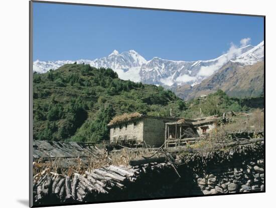 Thakkali House with Dhaulagiri Behind, Kali Gandaki Valley, Annapurna Region, Himalayas, Nepal-Tony Waltham-Mounted Photographic Print