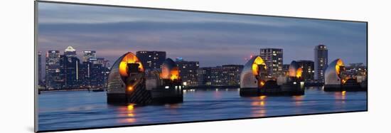 Thames Barrier dusk panorama with Canary Wharf beyond, London, England, United Kingdom, Europe-Charles Bowman-Mounted Photographic Print