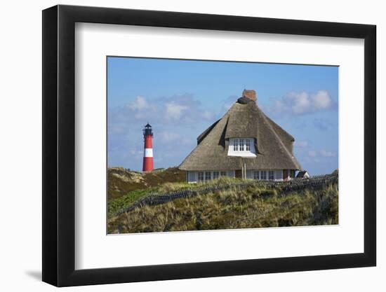 Thatched Roof House in the 'Kersig-Siedlung' of Hšrnum in Front of the Lighthouse-Uwe Steffens-Framed Photographic Print