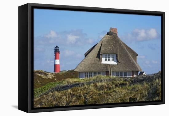 Thatched Roof House in the 'Kersig-Siedlung' of Hšrnum in Front of the Lighthouse-Uwe Steffens-Framed Premier Image Canvas