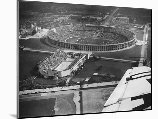 The 1936 Berlin Olympic Stadium, Aerial View, in Berlin, Germany in 1936-Robert Hunt-Mounted Photographic Print