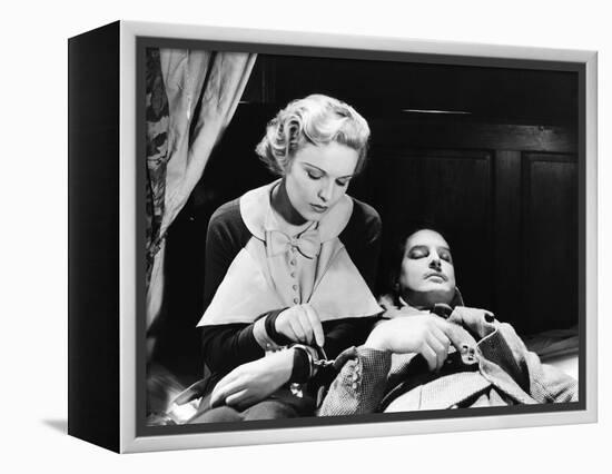 THE 39 STEPS, 1935 directed by ALFRED HITCHCOCK Madeleine Carroll / Robert Donat (b/w photo)-null-Framed Stretched Canvas