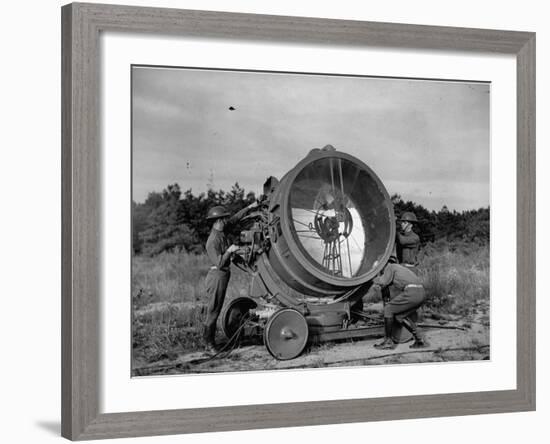 The 62nd Coast Artillery Concealing the Searchlight for Obvious Reasons-Carl Mydans-Framed Premium Photographic Print