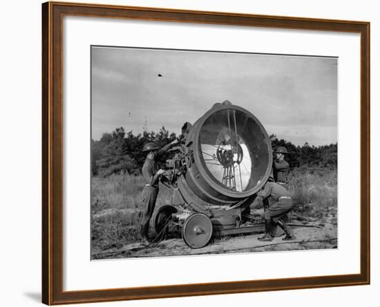 The 62nd Coast Artillery Concealing the Searchlight for Obvious Reasons-Carl Mydans-Framed Premium Photographic Print