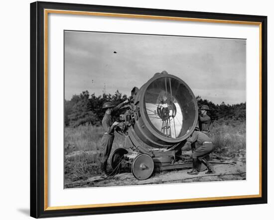 The 62nd Coast Artillery Concealing the Searchlight for Obvious Reasons-Carl Mydans-Framed Premium Photographic Print