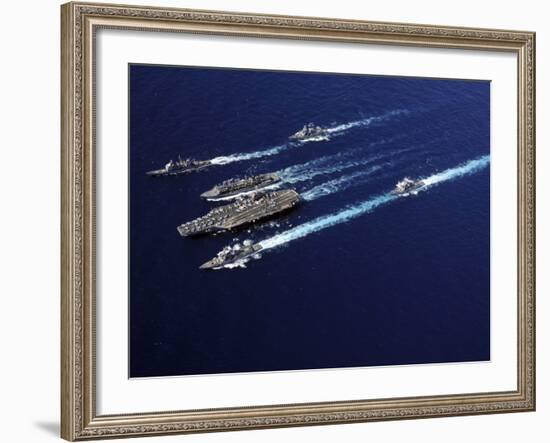 The Abraham Lincoln Carrier Strike Group Ships Cruise in Formation in the Pacific Ocean-Stocktrek Images-Framed Photographic Print